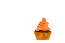 Festive Close-up View Of Decorative Homemade Halloween White And Orange Frosted Cupcakes With Eyes On White Background. Text Space Concept.