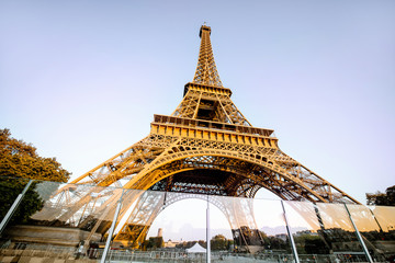 View from below on Eiffel tower during the sunset in Paris