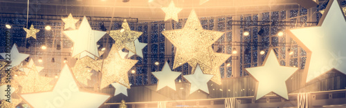 Fotomural Stars shape show celebrity background with spotlights soffits vintage yellow