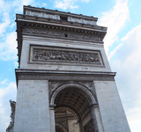 Fototapeta Paryż - Details on the Arc de Triomphe (Triumphal Arch) in Paris. Side view