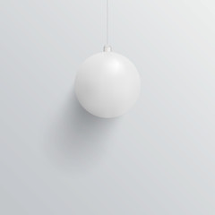 White mat christmas ball on white background. Concept of minimal xmas and new year design