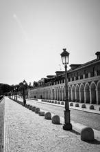 Awesome Vertical Photo In Black And White Of The House Of The Infants In Aranjuez. Path Around The Palatial Building.