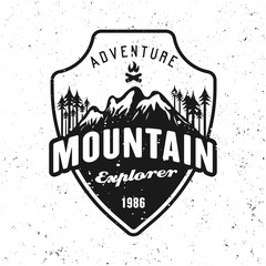 mountains and forest black vector badge on white