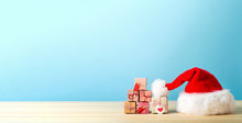 Santa Hat And Tiny Christmas Gift Boxes