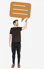 Sticker - Cheerful man holding a blank speech bubble symbol