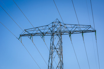 Power Pylon with a blue sky on the back