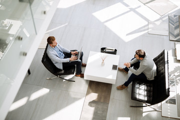 Group of business people working as team in office