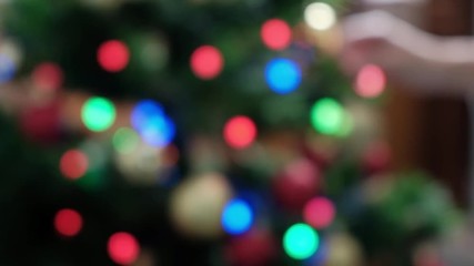 christmas background with colorful glowing lights.