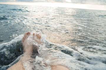  Feet in the water by the sea
