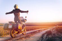 Motorbiker Travelling, Autumn Day, Motorcycle Off Road, The Driver Stands With Open Arms To The Side, To Meet A New Day, Adventurer, Extreme Tourism, Cold Weather Clothes, Light Tinting