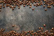 © lilechka75 - Food background with roasted black coffee beans.Top view with copy space.