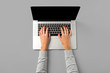 Overhead shot of woman working on laptop