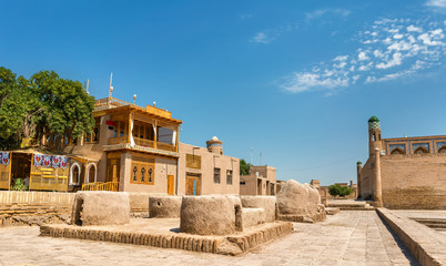 Poster - Historic buildings at Itchan Kala fortress in the historic center of Khiva. UNESCO world heritage site in Uzbekistan