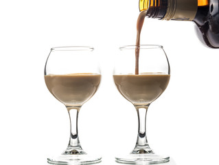 Pour chocolate thick liquor in two round glasses