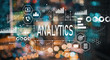 © Tierney - Analytics with blurred city abstract lights background