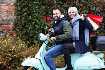 Sticker - Portrait of happy couple with shopping bags after shopping in city