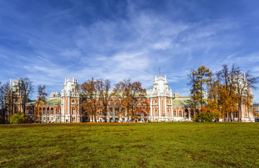 People walk near the Grand Tsaritsyn Palace on a sunny autumn day, Moscow, Russia