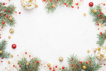 Bright Christmas Frame, Red And Gold Christmas Decorations On White Background. Copy Space. Winter Holidays, New Year.