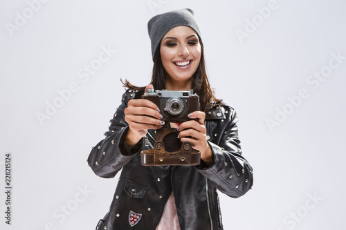 Modern Lifestyle Ideas Open Happy Caucasian Brunette In Black Leather Jacket Posing With Old School Film Photocamera Against White Focus On Camera Stock Photo Adobe Stock