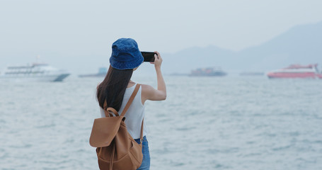 Canvas Print - Woman take photo on cellphone