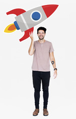 Wall Mural - Creative man with a launching rocket symbol