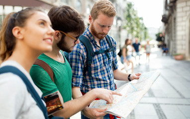 Wall Mural - Happy group of tourists traveling and sightseeing