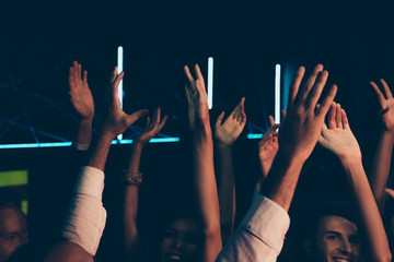 Sticker - Diverse cheerful friends audience with raised hands at popular w