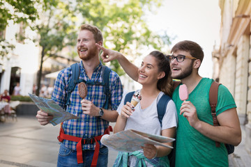 Wall Mural - Happy group of tourists traveling and sightseeing