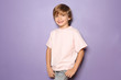 © Pixel-Shot - Little boy in t-shirt on color background