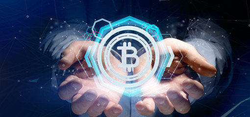 Poster - Man holding a technology Bitcoin icon on a circle 3d rendering