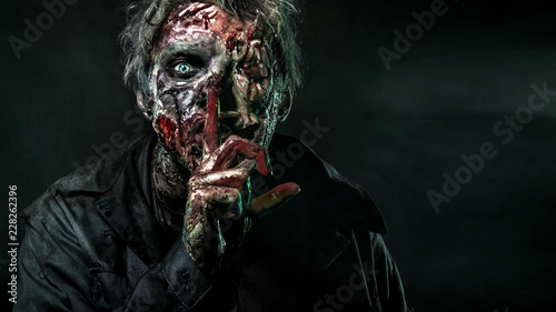 Cuadros en Lienzo Close-up portrait of a horrible scary zombie man