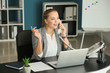 © Pixel-Shot - Beautiful female secretary talking on telephone in office