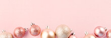 Pink Baubles In Row On Pink