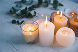 Beautiful burning candles on wooden table