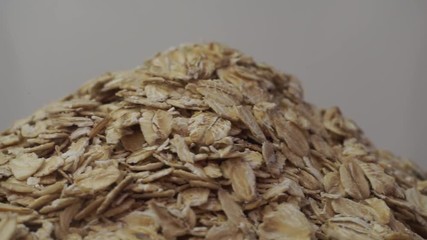 Poster - Hill of oatmeal on a white background, rotation 360 degrees. 