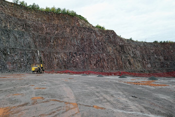 Wall Mural - Driller in a Porphyry mine quarry.