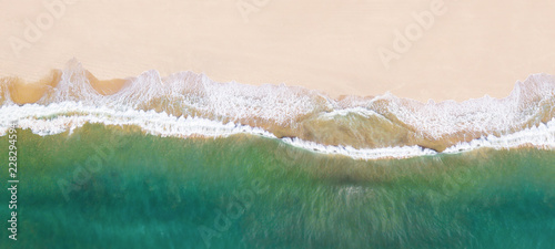 Fotografía Waves on the beach as a background