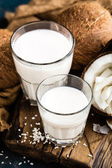 Poster - Fresh coconut milk in glass, vegan non dairy healthy drink