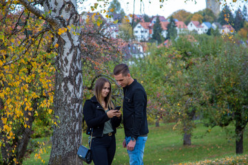 Funny couple laughing with a white perfect smile