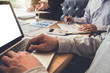 © Freedomz - Teamwork of business colleagues, consultation and conference new strategy plan business and market growth on financial document graph report, professional occupation, Partner meetings and briefing
