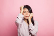 © halfbottle - Young Asian woman got sick and  headache.