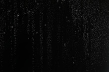 Black Wet Background / Raindrops For Overlaying On Window, Concept Of Autumn Weather, Background Of Drops Of Water Rain On Glass Transparent