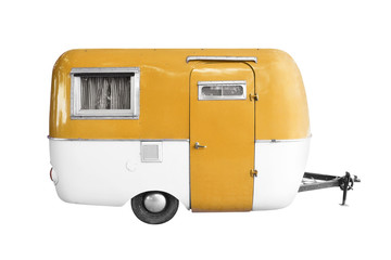 vintage caravan or camper trailer isolated on white