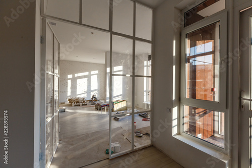 Interior Empty Office Light Room With White Wallpaper Without Glass Doors And Windows By Angelov Interior Empty Office Light Room With White Wallpaper Without Furniture In A New Building Renovation Or
