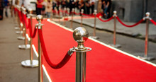 Red Carpet And Barrier On Entrance