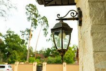 Street Metal Lamp Stylized Mounted On A Brick Wall