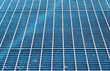 background texture-close up of the pattern of an industrial metal walkway grating