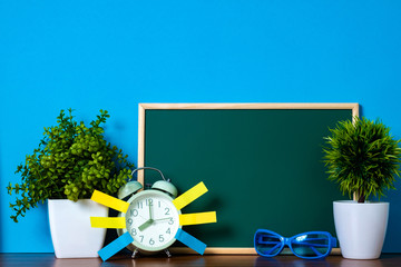 Wall Mural - Note paper sticky and vintage alarm clock and blank green chalkboard on table with copy space for add text notice something, list memo and schedule concept.