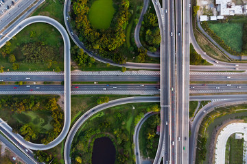 Wall Mural - Aerial top view photo from flying drone of a Road traffic an important infrastructure in Thailand