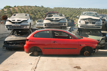 A graveyard of cars, broken cars sell on spare parts.